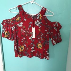 Red floral blouse